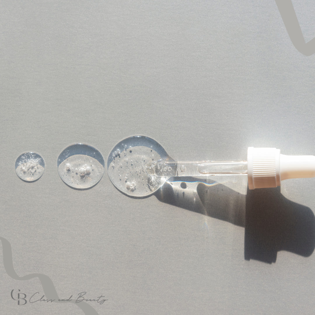 Serum droplets on a surface, representing essential products to repair the skin barrier.